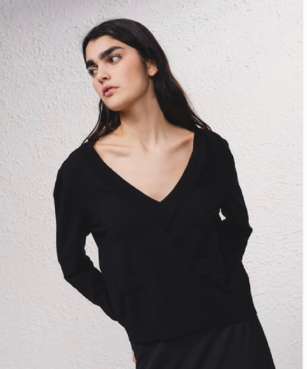 Pull col poches plaquées