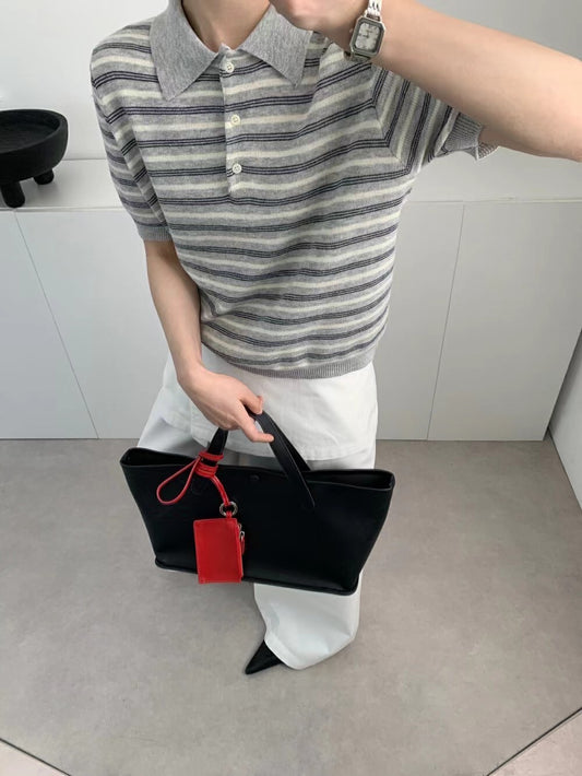 Polo rayé gris blanc noir manches courtes en maille