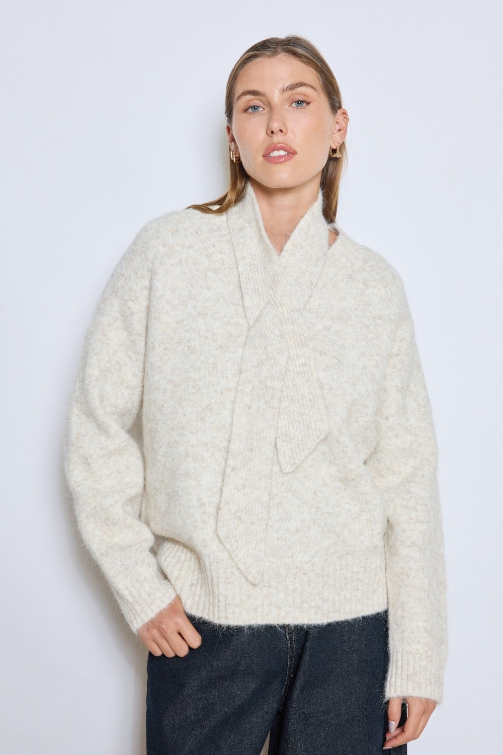 Pull écru col V et lien